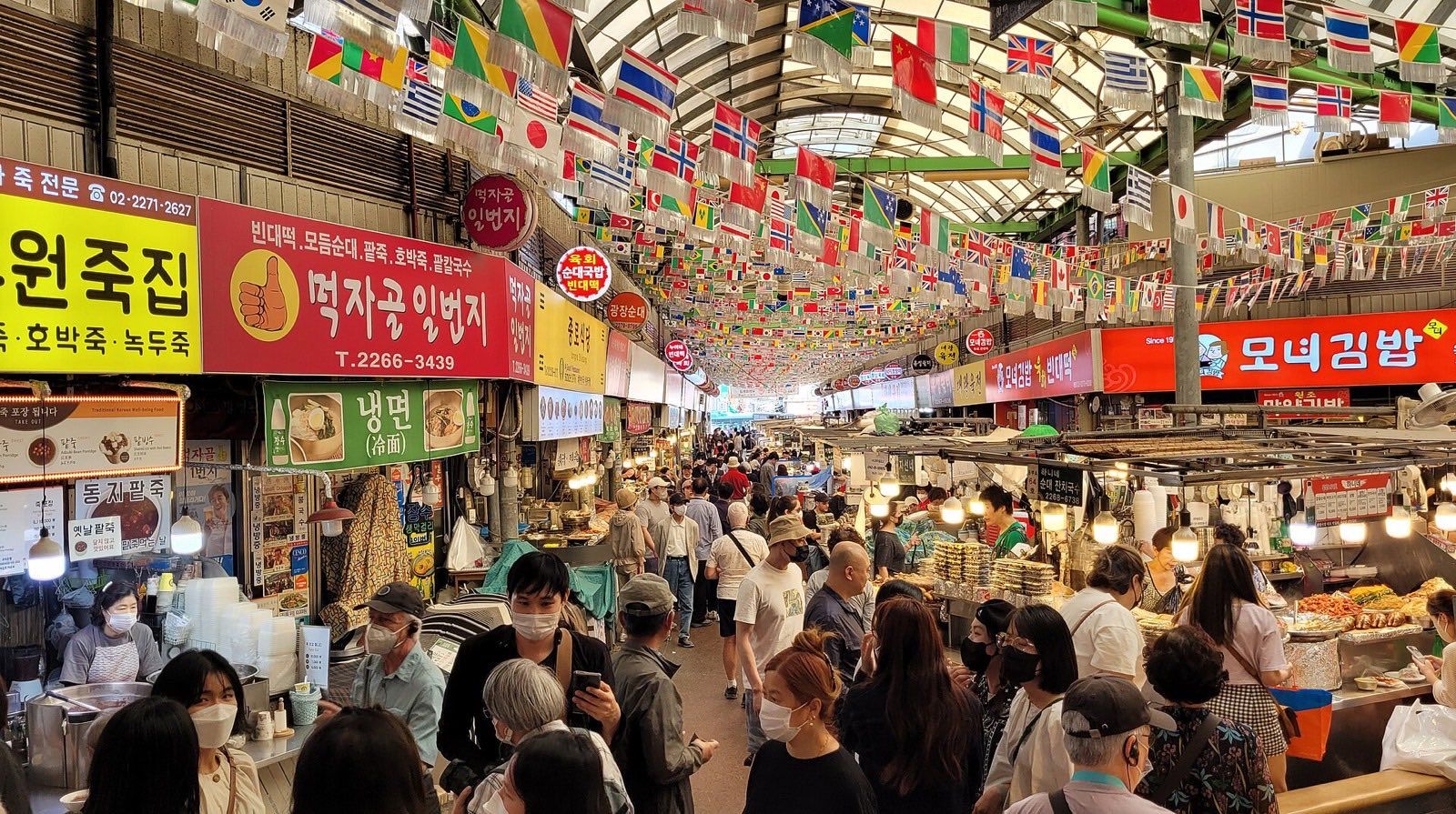 Bindaetteok griddles at Gwangjang Market food alley